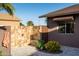 Private outdoor shower with stone tile and landscaping at 7801 E Davenport Dr, Scottsdale, AZ 85260