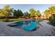 Relaxing swimming pool with a floating lounger in a large backyard at 7801 E Davenport Dr, Scottsdale, AZ 85260