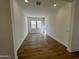 Bright and airy bedroom with wood-look flooring at 3812 W Antelope Way, San Tan Valley, AZ 85144
