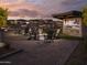 Community outdoor space with fire pit and large screen at 3812 W Antelope Way, San Tan Valley, AZ 85144