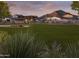 Expansive green lawn with a community pavilion in the background at 3812 W Antelope Way, San Tan Valley, AZ 85144