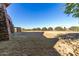 Large grassy backyard with plenty of space for recreation at 10065 E Thatcher Ave, Mesa, AZ 85212