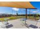 Outdoor bocce ball area with seating at 10065 E Thatcher Ave, Mesa, AZ 85212