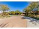 Modern clubhouse exterior with landscaping at 10065 E Thatcher Ave, Mesa, AZ 85212