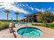 Relaxing spa adjacent to the pool at 10065 E Thatcher Ave, Mesa, AZ 85212
