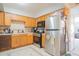 Kitchen features stainless steel appliances and ample cabinetry at 3840 N 43Rd Ave # 58, Phoenix, AZ 85031