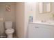 Simple bathroom, includes a vanity and toilet at 3840 N 43Rd Ave # 58, Phoenix, AZ 85031
