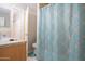 Bathroom with shower, toilet, and updated vanity at 3840 N 43Rd Ave # 58, Phoenix, AZ 85031