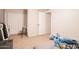 Bright bedroom featuring double doors to closet at 3840 N 43Rd Ave # 58, Phoenix, AZ 85031