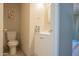 Clean bathroom with white vanity and toilet at 3840 N 43Rd Ave # 58, Phoenix, AZ 85031