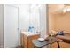 Clean bathroom with sink, vanity, and adjacent bedroom view at 3840 N 43Rd Ave # 58, Phoenix, AZ 85031