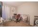 Bedroom with work station and large wall art at 3840 N 43Rd Ave # 58, Phoenix, AZ 85031