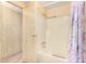 Clean bathroom with shower/tub combo and updated flooring at 5546 E Player Pl, Mesa, AZ 85215