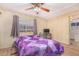 Cozy bedroom with a double bed and ceiling fan at 5546 E Player Pl, Mesa, AZ 85215
