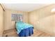 Bedroom with a single bed and ample natural light at 5546 E Player Pl, Mesa, AZ 85215