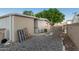 Spacious backyard with gravel landscaping and shed at 5546 E Player Pl, Mesa, AZ 85215