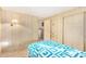 Bedroom with a single bed and access to the kitchen at 5546 E Player Pl, Mesa, AZ 85215