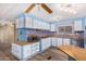 Kitchen with light blue cabinets, wood countertops, and tile backsplash at 5546 E Player Pl, Mesa, AZ 85215