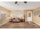 Living room with entryway view and wood-look floors at 5546 E Player Pl, Mesa, AZ 85215