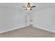 Bedroom with ceiling fan and access to upstairs hallway at 2120 N 125Th Ave, Avondale, AZ 85392