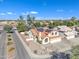Two-story house with solar panels, double garage, and a landscaped yard at 2120 N 125Th Ave, Avondale, AZ 85392