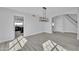 Open concept dining room with kitchen view and hardwood floors at 2120 N 125Th Ave, Avondale, AZ 85392