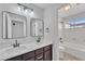 Modern bathroom with double vanity and a bathtub at 2120 N 125Th Ave, Avondale, AZ 85392