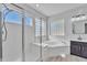Bathroom with shower, soaking tub, and vanity at 2120 N 125Th Ave, Avondale, AZ 85392