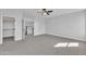Bedroom with carpet and access to loft at 2120 N 125Th Ave, Avondale, AZ 85392