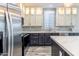 Modern kitchen with stainless steel appliances and an island at 7750 E Broadway Rd # 723, Mesa, AZ 85208