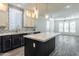 Open kitchen features a large island and plenty of cabinet space at 7750 E Broadway Rd # 723, Mesa, AZ 85208