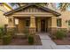 Inviting front porch with stone accents and landscaping at 924 S Osborn Ln, Gilbert, AZ 85296