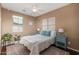 Bright bedroom with a queen-size bed and teal accents at 924 S Osborn Ln, Gilbert, AZ 85296