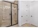 Spacious bathroom with a walk-in shower with a built-in bench at 17197 W Thousand Oaks St, Surprise, AZ 85388
