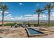 Water feature and seating area with mountain views at 17404 E Monument Ct, Rio Verde, AZ 85263