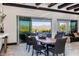 Bright dining area with sliding glass doors leading to a patio and mountain views at 17404 E Monument Ct, Rio Verde, AZ 85263