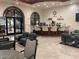 Spacious community lobby with comfortable seating and coffee bar at 3301 S Goldfield Rd # 1009, Apache Junction, AZ 85119