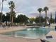 Refreshing community pool perfect for relaxation and recreation at 3301 S Goldfield Rd # 1009, Apache Junction, AZ 85119