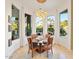 Bright dining room with glass table and mountain views at 5112 E Pasadena Ave, Phoenix, AZ 85018