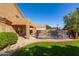 Home with a sparkling pool and grassy backyard at 16847 S 13Th Way, Phoenix, AZ 85048
