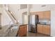 Kitchen with stainless steel appliances and granite countertops at 16847 S 13Th Way, Phoenix, AZ 85048