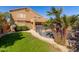 Large backyard with a sparkling pool and lush landscaping at 16847 S 13Th Way, Phoenix, AZ 85048