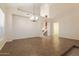 Spacious dining room with tile floors and a view of the staircase at 16847 S 13Th Way, Phoenix, AZ 85048