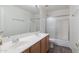 Bathroom with double vanity, shower, and bathtub at 16847 S 13Th Way, Phoenix, AZ 85048