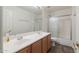 Bathroom with double vanity, tub, and shower at 16847 S 13Th Way, Phoenix, AZ 85048