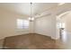 Bright dining room with tile flooring and a chandelier at 16847 S 13Th Way, Phoenix, AZ 85048