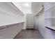 Large walk-in closet with ample shelving and hanging space at 16847 S 13Th Way, Phoenix, AZ 85048
