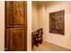 Home office with built-in cabinetry and wood desk at 27440 N Alma School Pkwy # 33-1, Scottsdale, AZ 85262