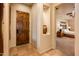 Bright hallway with access to bedroom and other rooms at 27440 N Alma School Pkwy # 33-1, Scottsdale, AZ 85262