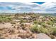 Aerial view of desert landscape with rock formations at 27440 N Alma School Pkwy # 33-1, Scottsdale, AZ 85262
